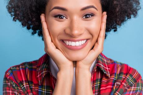 Woman with pretty teeth from a smile makeover in Woodland Hills